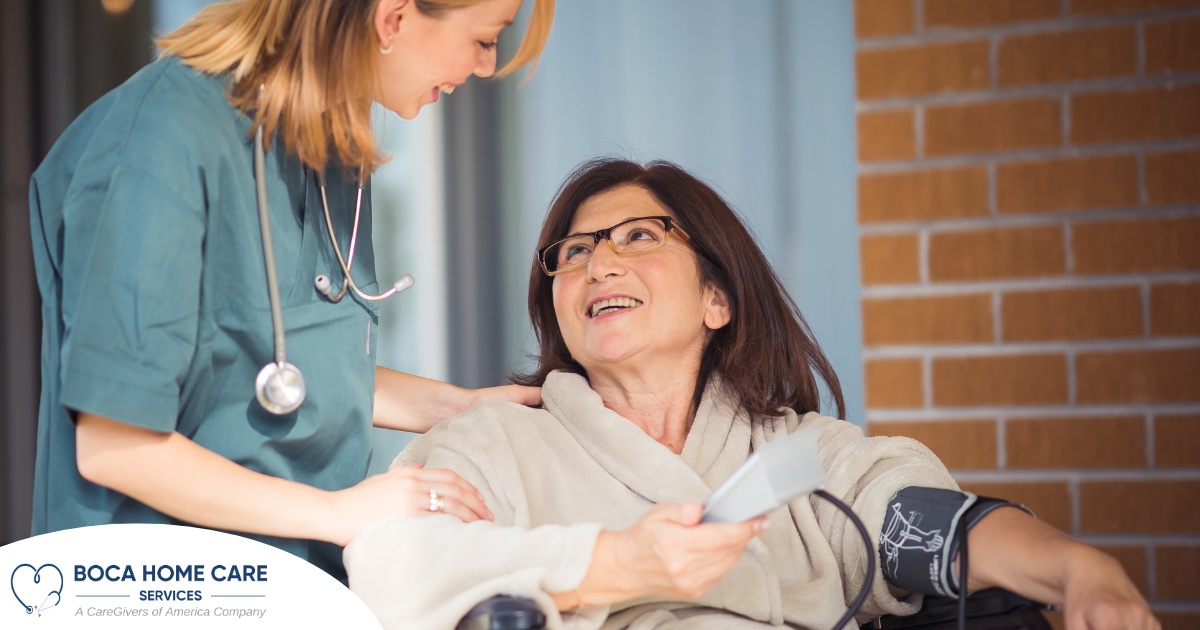 A happy home nurse helps a smiling patient in a wheelchair, representing how home health can help with pain management.